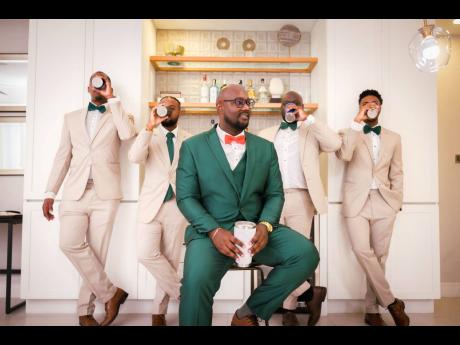 The groomsmen toast and sip to new beginnings and everlasting love.