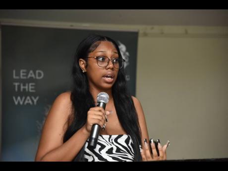 University student Jade Rowe addresses the media launch of the Your Mind Matters project at the Liguanea Club in New Kingston on Monday.