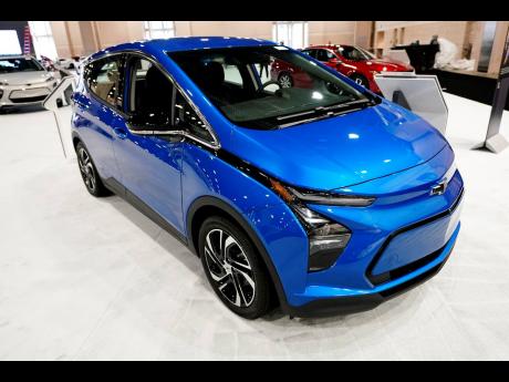 File photo shows a Chevrolet Bolt is displayed at the Philadelphia Auto Show on January 27, 2023, in Philadelphia. The St. Lucia government has announced an extension of the  reduced import duty and excise tax rates, specifically for hybrid and  electric v