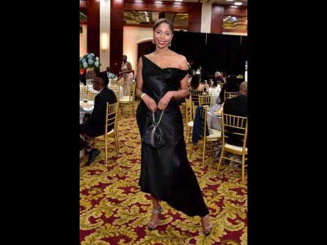 Julian Dixon, co-founder and chief executive officer, Jamaica Sotheby’s International Realty, adds her own touch of glamour to the banquet.