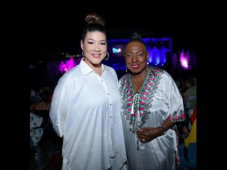 Tessanne Chin, founder of VoiceBox, shares lens time with Minister of Culture, Gender, Entertainment and Sport, Olivia Grange, at the Four Seasons of Christmas.