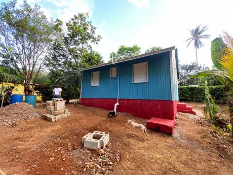 Annette Thompson’s new home, which Michelle Henry paid charity organisation Food For The Poor Jamaica to construct.