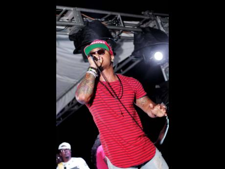 Antigua-born, Trinidad-raised soca artiste, Ricardo Drue, performing at Sunnsation’s Sunset Cocoa Jouvert in 2015.