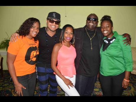 In this 2014 photo, Trinidadian artiste Blaxx (right) and fellow soca singer Ricardo Drue (second left) popped into Kingston for Bacchanal Jamaica carnival on Friday. Here they relax with Pepsi’s Brand manager Carla Hollingsworth (right) Darnella Simmon