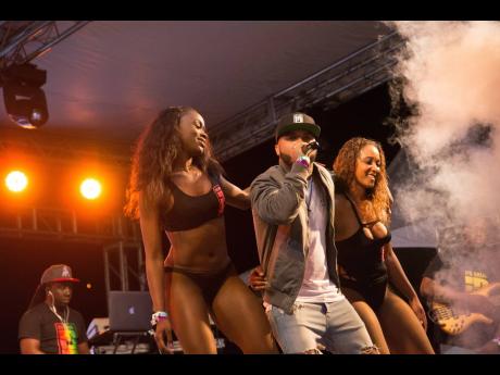 Bacchanal Fridays Finale on April 7, 2017 at the Mas Camp. Fans flocked to the Smirnoff-sponsored event to see performances by Ricardo Drue, who is flanked by his dancers.