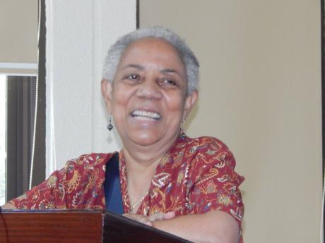 Jamaican-Canadian poet Professor Lillian Allen reading her poetry at The UWI, Mona, on Sunday.