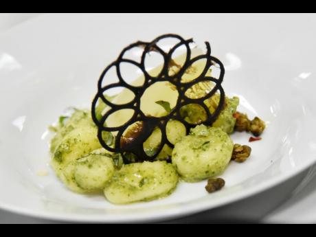 Truffle Bourgogne Gnocchi is a mixture of Jamaican and European flavours as the gnocchi is doused in a callaloo pesto and topped with parmesan cheese.