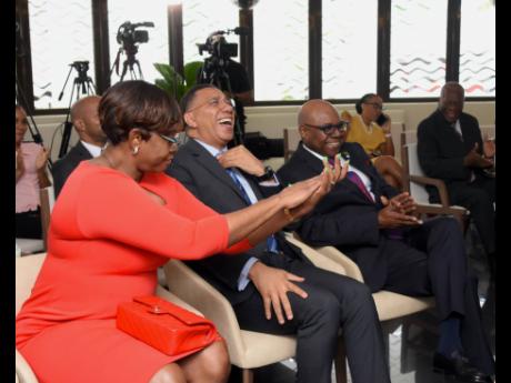 Prime Minister Andrew Holness, (second left) is in stitches while sharing a moment with his wife and Speaker of the House of Representatives, Juliet  Holness, and Tourism Minister Edmund Bartlett during the opening of the new Hideaway at Royalton Blue Wate