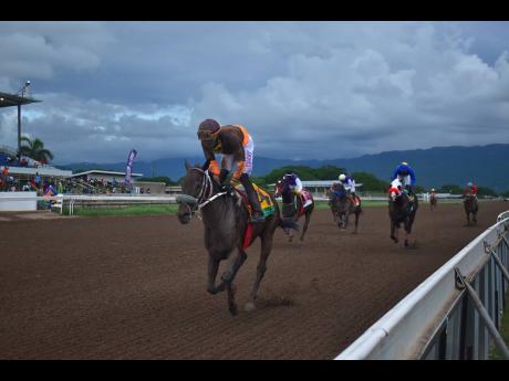 PERFECT BREW, ridden by Tevin Foster, wins the third running of the I’m Satisfied Trophy over six furlongs for three-year-olds and upwards, an open allowance stakes at Caymanas Park on October 7.
