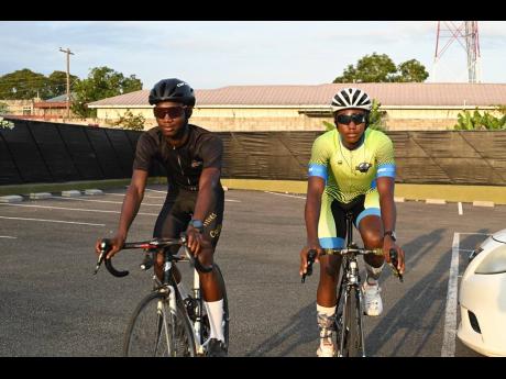 Peter Robinson (left) and Jaequan Dixon are expected to be on show at the ECC cycling race on Sunday in Portmore. 