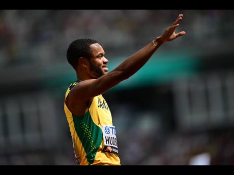 Jamaica’s Andrew Hudson waves to the audience after competing in a men’s 200-metre heat at the 2023 World Athletics Champion inside the National Athletics Centre in Budapest, Hungary, on August 23. 