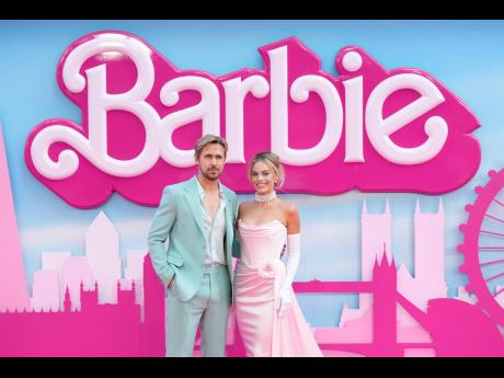 Ryan Gosling (left) and Margot Robbie pose for photographers upon arrival at the London premiere of ‘Barbie’ in July 2023.