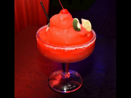 Delight in the sipping pleasures of the strawberry frozen daiquiri, served in a fish bowl style.