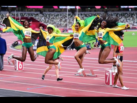 Jamaica’s women celebrate their win in the 4x100 metres final at the Tokyo Olympic Games. From left: Shericka Jackson, Shelly-Ann Fraser-Pryce, Briana Williams and Elaine Thompson Herah.