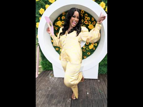 Celebrity make-up artist Chevelle Powell rocks this uber chic suit from Chic Ladies Boutique.