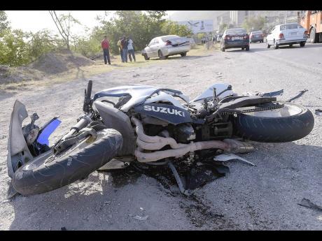 File photo shows a damaged motorcycle that was involved in an accident along Norman Manley Boulevard on Friday, June 9, 2017, with a Toyota Mark 2 motor car. The National Road Safety Council (NRSC) says its figures for 2023 show that 129 motorcyclists have