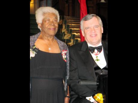 
Lillie Johnson with the 28th Lieutenant Governor of Ontario, David Onley, after she was  invested with the Order of Ontario in 2011.  