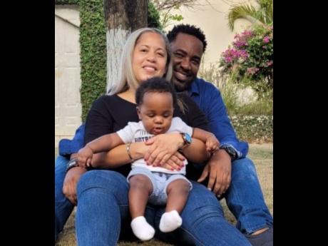 The Lowe family: Jamaican Strotrell Lowe and his wife, Camille, and their adopted son Lucas.