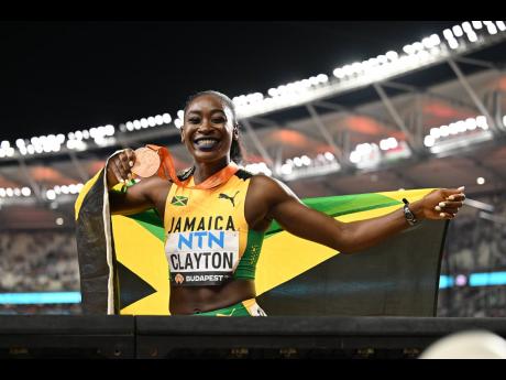 Jamaica’s Rushell Clayton celebrates a bronze medal in the women’s 400-metre hurdles at the 2023 World Athletics Championships at the National Athletics Centre in Budapest, Hungary on August 24. 