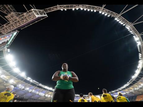 
Danniel Thomas-Dodd, of Jamaica, speaks with her coach during the women’s shot put final at the 2023 World Athletics Championships at the National Athletics Centre in Budapest, Hungary on August 26