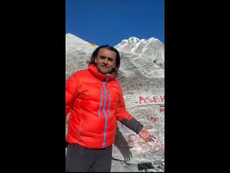 Dushyant Savadia, founder and CEO of Amber Group, stops for a photo on Mount Everest. 
