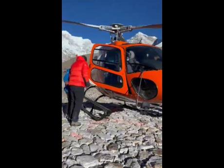 Dushyant Savadia took a helicopter for his descent from 18,500 feet on Mount Everest.