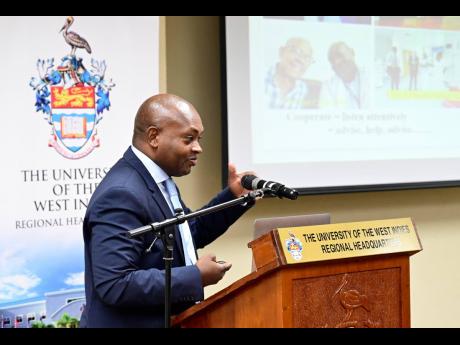 Professor Dabor Resiere, head of the Critical Care Unit at the University Hospital of Martinique, gives the keynote address during the One Caribbean Solutions Conference held at The UWI Regional Headquarters in St Andrew last Thursday. 