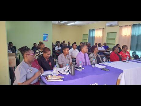 Participants in the South St Catherine police-initiated mental health workshop at the Hundred-man divisional headquarters in Portmore, St Catherine, yesterday.