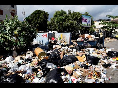 This February 2022 photo shows a pile of garbage on Spanish Town Road in Kingston. Citing garbage collection as ‘a big problem’, Mayor Delroy Williams said that the Kingston and St Andrew Municipal Corporation has signed a contract for waste removal ac