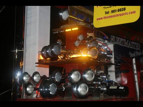 Truck horns blared during the Munk Garage Truck Show and New Year’s Eve Party at the Woodleigh Sports Complex in May Pen, Clarendon.
