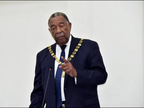 Chairman of the Westmoreland Municipal Corporation and mayor of Savanna-la-Mar, Councillor Bertel Moore, addresses the regular monthly meeting of the Westmoreland Municipal Corporation on Thursday.