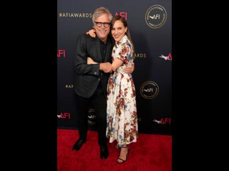Todd Haynes (left), and Natalie Portman arrive at the AFI Awards on Friday, at the Four Seasons Beverly Hills in Beverly Hills, California.