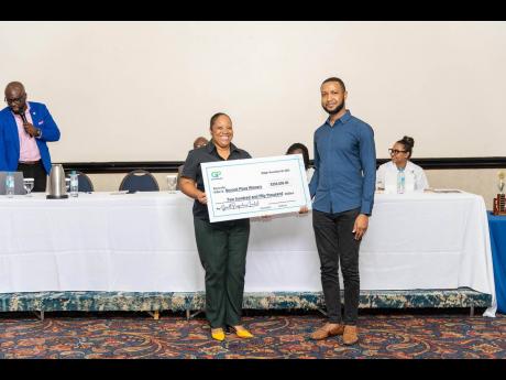 Takeese Gilpin Allen, co-founder and director Growth Perspectives Limited handing over the second place prize for the GP Innovative 2023 Innovation competition to Jermaine Bryan of Blueprint Farms from the University of the Commonwealth Caribbean recently.