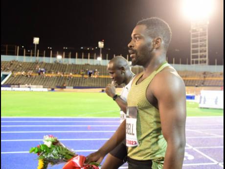 Michael Campbell (foreground) winner of the Men’s B 100m final at last year’s Racers Grand Prix at the National Stadium. Campbell won the event in 10.08 seconds.