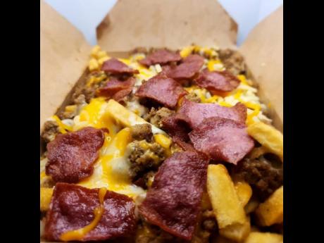 This large beef loaded fries just got better with the addition of turkey bacon.