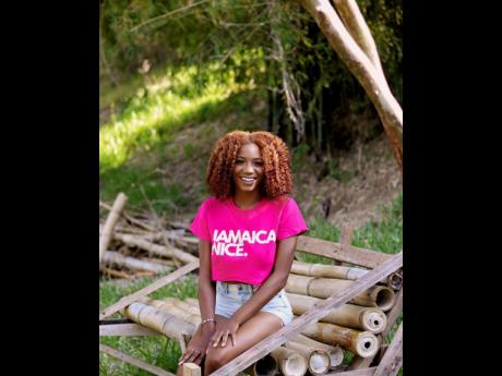 Pretty in pink, Adams’ shirt says it best: Jamaica Nice.