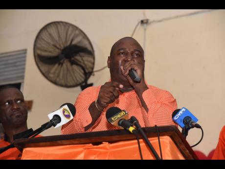 Dayton Campbell, general secretary of the People’s National Party (PNP) and prospective candidate for Westmoreland Eastern in the next general election, addresses PNP supporters during a meeting at The Manning’s School in Savanna-la-Mar, Westmoreland, 