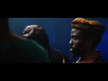 Hector Lewis as Carlton ‘Carly’ Barrett in a scene from ‘Bob Marley: One Love’.