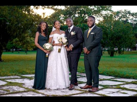 The lovely bride and groom kept it simple with a small yet significant wedding party, featuring maid of honour Tiffany Ellis (left) and best man Khemani Thompson (right).