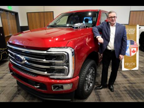 Andrew Kernahan, super duty chief program engineer, Ford Motor Company, stands with a Ford F250 Super Duty. 