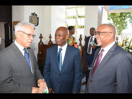 Shipping Association of Jamaica CEO Trevor Riley (right) greets Director General of the Maritime Authority of Jamaica, Rear Admiral (ret’d) Peter Brady (left) and Custos Rotulorum of Kingston Steadman Fuller at the association’s service of thanksgiving