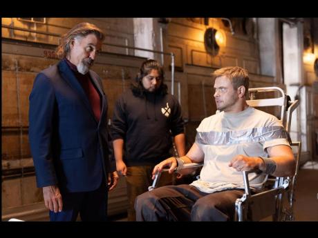 Kellan Lutz (right) and Jeff Fahey in a scene from ‘Due Justice’.