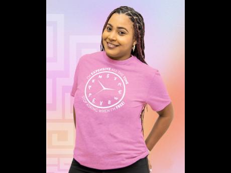 One of Donna Mesquita’s favourite shirts is, ‘I’m expensive all the time. Stop asking me when I’m free.’ This design is presented on a pink shirt, just for women.
