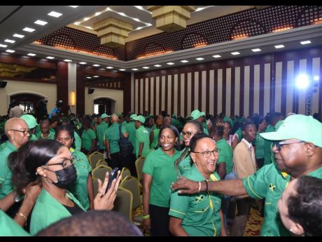 Jamaica Labour Party officials and supporters arrive for its national meeting of candidates and members of parliament at the Montego Bay Convention Centre in Rose Hall, St James yesterday. The meeting was held to announce the date for local government elec
