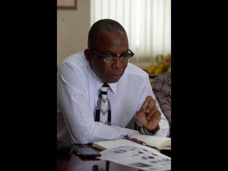 Glasspole Brown, Jamaica’s director of elections.