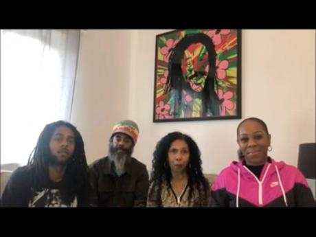 Yvonne Brown (second right), Dennis Brown’s widow, appears in a livestream, along with children (from left) Dennis, Daniel and Dinah. 
