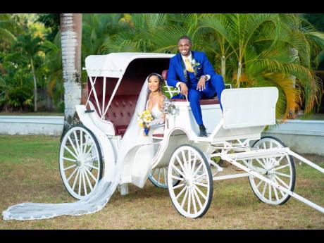 Wheels of love turning as the carriage carries Mr and Mrs Grant into a fairy tale of their own.