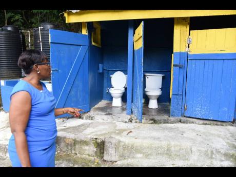 Principal Francine Taylor Arnett shows some of the toilet facilities at Grove Primary and Infant School that are badly in need of an upgrade.