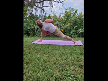 Looking to the heavens in this signature pose, Rushelle Townsend said yoga saved her.