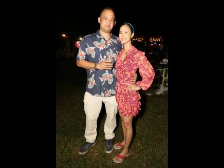 Newlyweds Dr Parris Lyew-Ayee Jr (left), director, GraceKennedy Limited, shares the frame with his partner in love, Dr Jessica Yap, whom he wed last week.